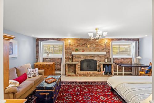 Bedroom - 531 Rue Principale, Saint-Sauveur, QC - Indoor With Fireplace