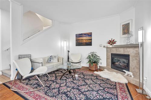 9-148 Roy Avenue, Penticton, BC - Indoor Photo Showing Living Room With Fireplace