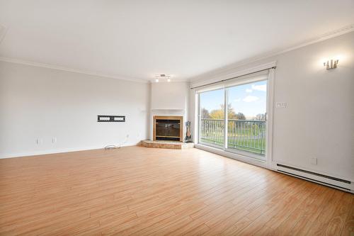 Salon - 9623 Rue Bellerive, Montréal (Mercier/Hochelaga-Maisonneuve), QC - Indoor Photo Showing Living Room With Fireplace