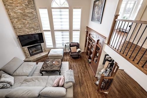 Salle familiale - 230 Rue Mirabel, Dollard-Des-Ormeaux, QC - Indoor Photo Showing Living Room With Fireplace
