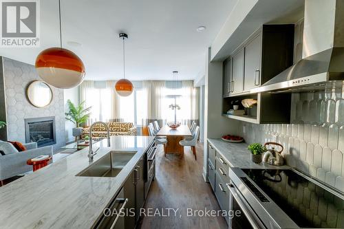1145 Cope Drive, Ottawa, ON - Indoor Photo Showing Kitchen With Fireplace With Upgraded Kitchen