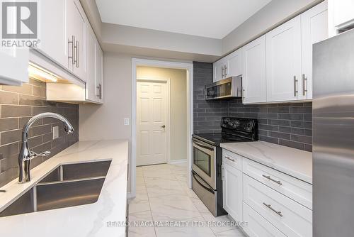 1 - 1616 Pelham Street, Pelham (Fonthill), ON - Indoor Photo Showing Kitchen With Double Sink
