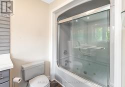 Bedroom 2 - upper level w ensuite virtually staged - 
