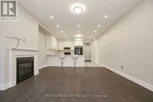 32 Dalbeattie Drive, Brampton, ON - Indoor With Fireplace