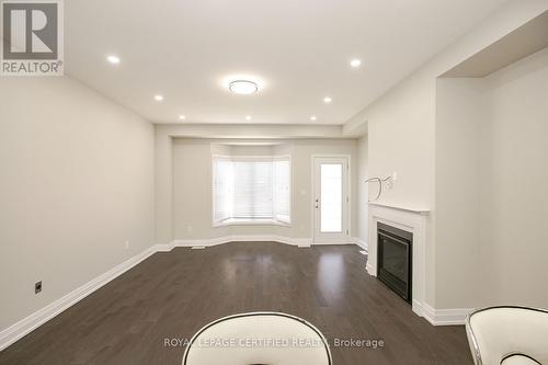 32 Dalbeattie Drive, Brampton, ON - Indoor Photo Showing Other Room With Fireplace