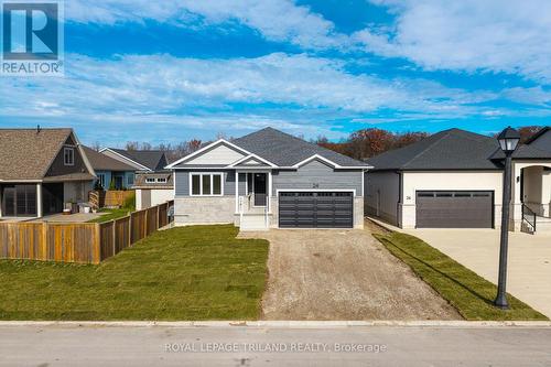 Let's head inside and tour this amazing new home. - 24 Brooklawn Drive, Lambton Shores (Grand Bend), ON - Outdoor With Facade
