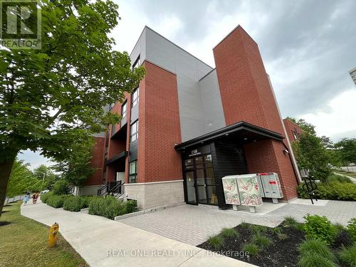 318 - 2100 Bridletowne Circle, Toronto, ON - Outdoor With Exterior