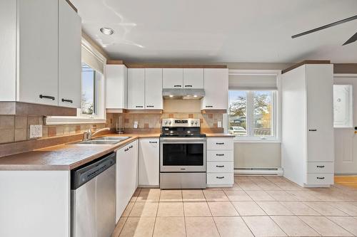 Cuisine - 68 Rue Clément, Rivière-Beaudette, QC - Indoor Photo Showing Kitchen With Double Sink