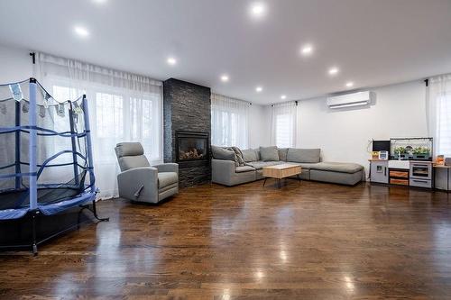 Salon - 2023 Route 133, Saint-Jean-Sur-Richelieu, QC - Indoor With Fireplace