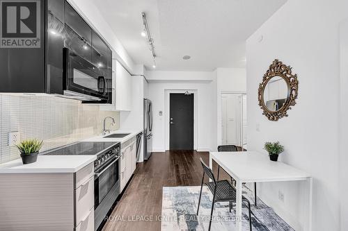 607 - 33 Shore Breeze Drive, Toronto, ON - Indoor Photo Showing Kitchen With Upgraded Kitchen