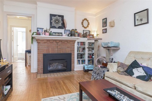 841/839 Princess Ave, Victoria, BC - Indoor Photo Showing Living Room With Fireplace