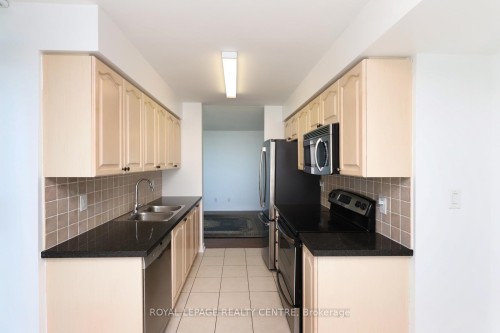 603-4850 Glen Erin Drive, Mississauga, ON - Indoor Photo Showing Kitchen With Double Sink