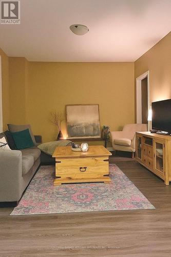 Front Unit Virtually Staged - 48 Main Street W, Mississippi Mills, ON - Indoor Photo Showing Living Room