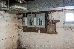 Unit 1B Basement Showing Modern Electrical Panels - 