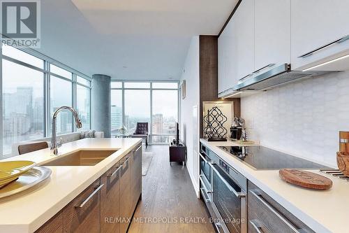 2102 - 488 University Avenue, Toronto, ON - Indoor Photo Showing Kitchen With Double Sink With Upgraded Kitchen