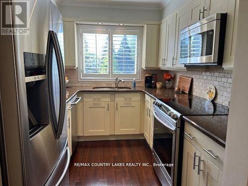 6 - 30 Laguna Parkway, Ramara, ON - Indoor Photo Showing Kitchen With Stainless Steel Kitchen With Double Sink