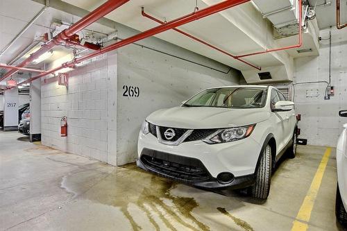 Garage - 205-2 Place Des Jardins-Des-Vosges, Montréal (Verdun/Île-Des-Soeurs), QC - Indoor Photo Showing Garage