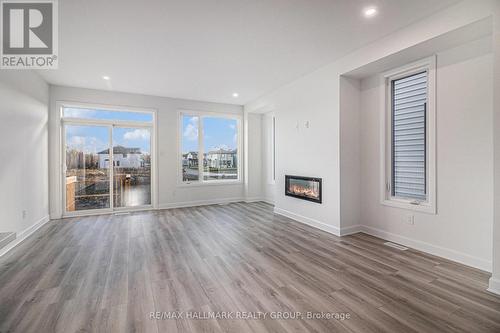 526 Reflection Street, Ottawa, ON - Indoor Photo Showing Living Room With Fireplace