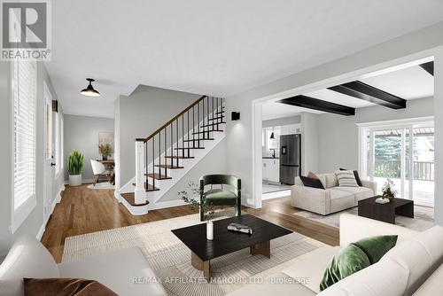 This photo is virtually staged - 1936 Concorde Avenue, Cornwall, ON - Indoor Photo Showing Living Room