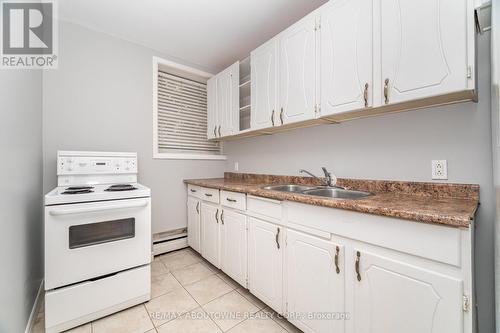 6 - 2138 Ghent Avenue, Burlington, ON - Indoor Photo Showing Kitchen With Double Sink