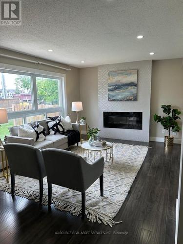 16 - 75 Ansondale Road, London South, ON - Indoor Photo Showing Living Room With Fireplace