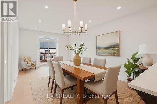 Virtually staged dining area - 201 - 12 Washington Street, Norwich, ON - Indoor Photo Showing Dining Room
