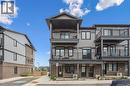View of front of property featuring brick siding - 30 Oat Lane, Kitchener, ON  - Outdoor With Balcony With Facade 