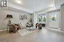 Living room with light wood-style flooring - 30 Oat Lane, Kitchener, ON  - Indoor 