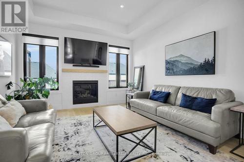 1928 Trailsway Drive, London South (South B), ON - Indoor Photo Showing Living Room With Fireplace