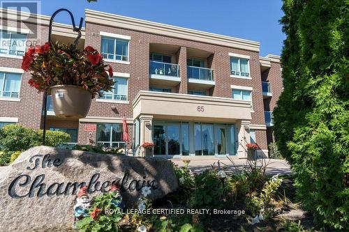 317 - 65 Via Rosedale, Brampton, ON - Outdoor With Balcony With Facade