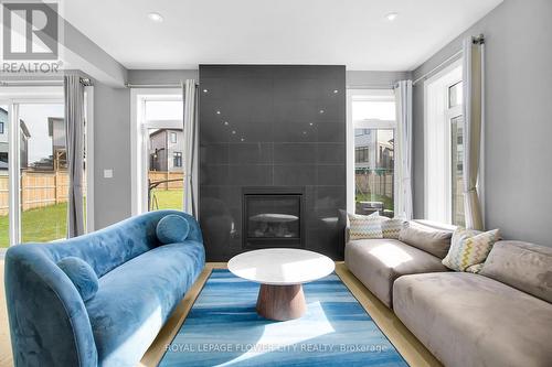 2424 Black Rail Terrace, London South, ON - Indoor Photo Showing Living Room With Fireplace