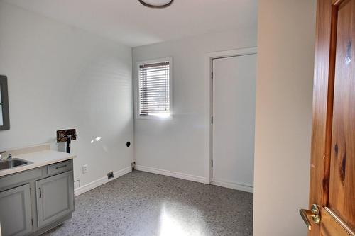 Salle de lavage - 1455 Rue Vézina, Rouyn-Noranda, QC - Indoor Photo Showing Other Room