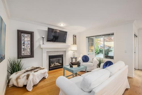118-665 Cook Road, Kelowna, BC - Indoor Photo Showing Living Room With Fireplace