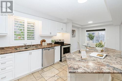 904 Frontenac Crescent, Woodstock, ON - Indoor Photo Showing Kitchen With Stainless Steel Kitchen With Double Sink