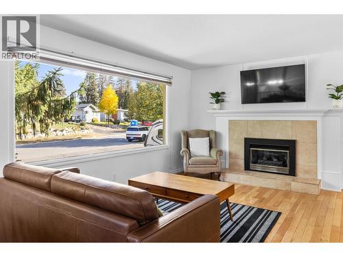 1112 Pinecrest Lane, Kelowna, BC - Indoor Photo Showing Living Room With Fireplace