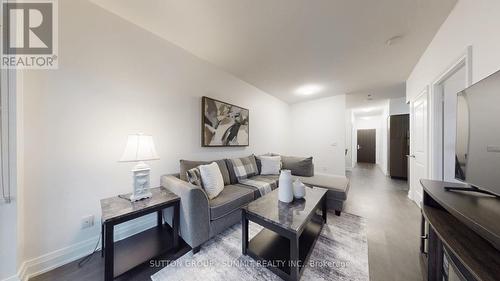 307 - 55 Speers Road N, Oakville, ON - Indoor Photo Showing Living Room
