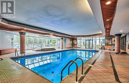 Pool & hot tub - 716 - 340 Watson Street W, Whitby, ON - Indoor Photo Showing Other Room With In Ground Pool