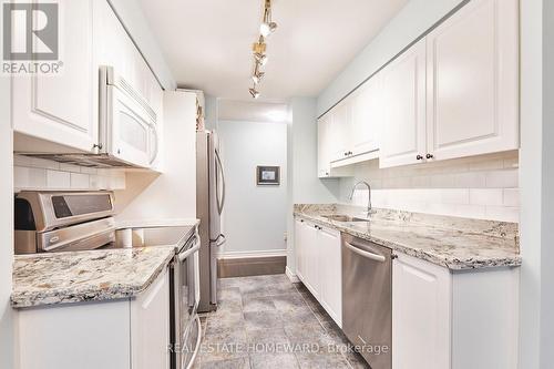 Galley Kitchen - 716 - 340 Watson Street W, Whitby, ON - Indoor Photo Showing Kitchen With Upgraded Kitchen