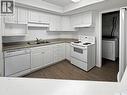 205 1152 103Rd Street, North Battleford, SK  - Indoor Photo Showing Kitchen With Double Sink 