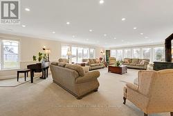 Sunroom lounge wrapped in windows - 