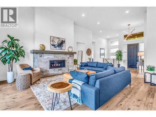 3452 Blue Grass Lane, Kelowna, BC - Indoor Photo Showing Living Room With Fireplace