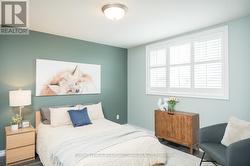 Sweet bedroom with large window - 