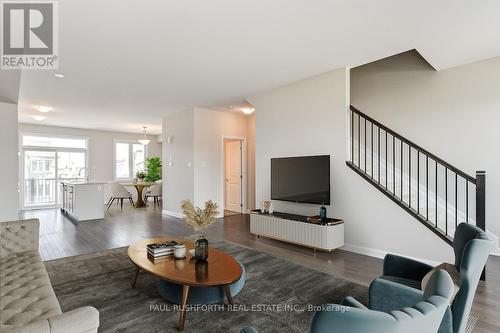 Virtually Staged-Living Room - 818 Everbloom Lane, Ottawa, ON - Indoor Photo Showing Living Room