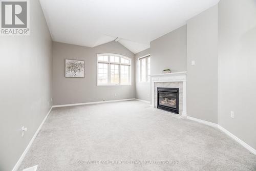 92 Deerfox Drive, Ottawa, ON - Indoor With Fireplace