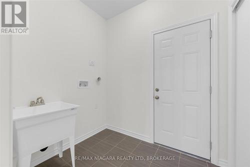 Main Floor Laundry - 25 Oriole Crescent, Port Colborne (Main Street), ON - Indoor Photo Showing Other Room