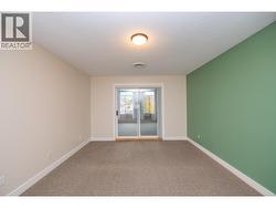 Patio doors lead to enclosed patio/deck area - 