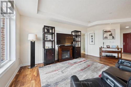 404 - 65 Bayberry Drive, Guelph (Village By The Arboretum), ON - Indoor Photo Showing Other Room With Fireplace