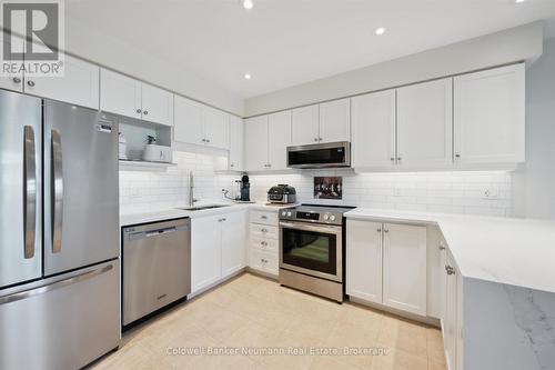404 - 65 Bayberry Drive, Guelph (Village By The Arboretum), ON - Indoor Photo Showing Kitchen With Stainless Steel Kitchen