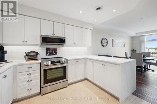 404 - 65 Bayberry Drive, Guelph (Village By The Arboretum), ON - Indoor Photo Showing Kitchen