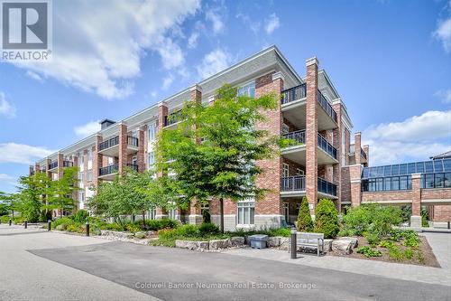 404 - 65 Bayberry Drive, Guelph (Village By The Arboretum), ON - Outdoor With Balcony With Facade